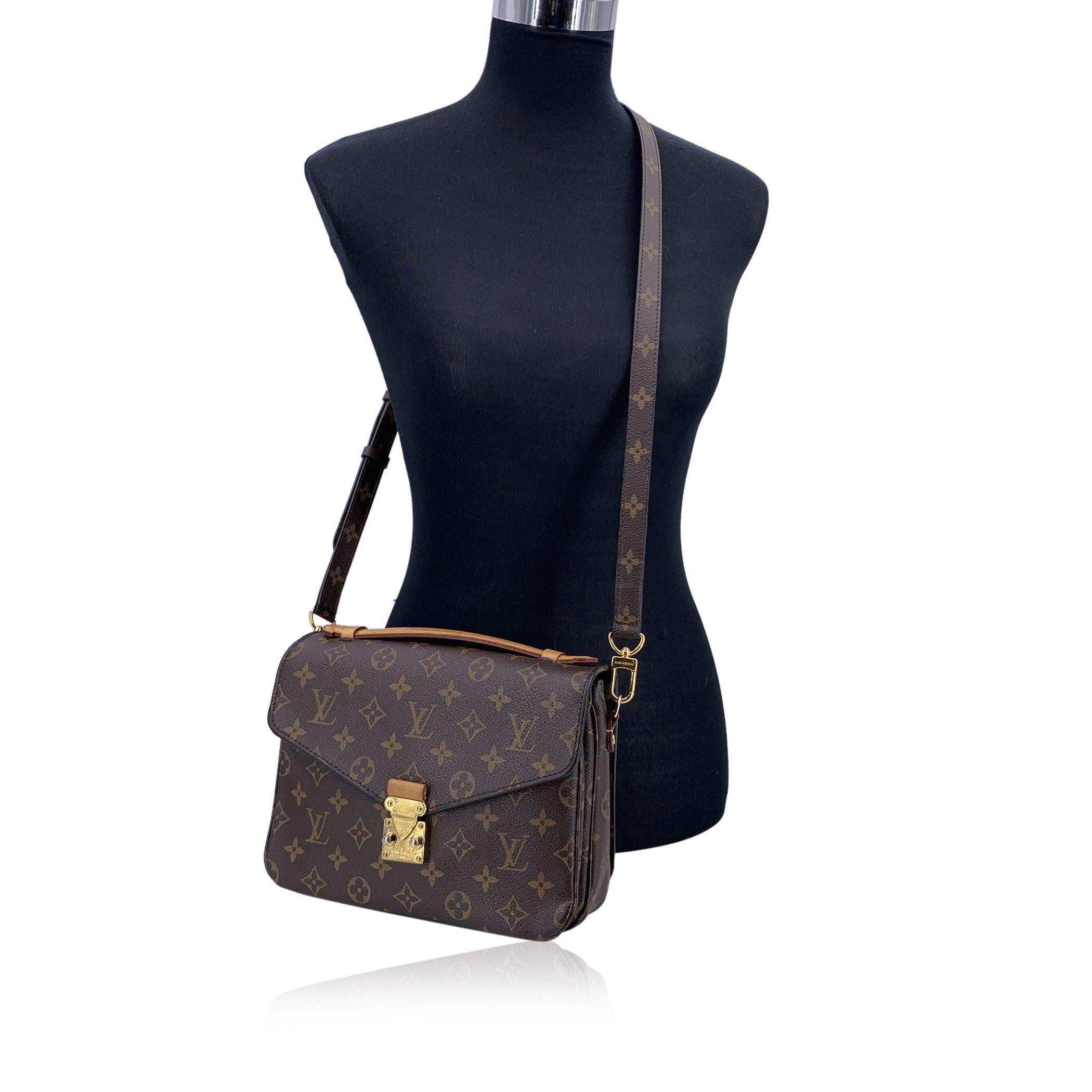This beautiful Bag will come with a Certificate of Authenticity provided by Entrupy. The certificate will be provided at no further cost. Step into the world of timeless elegance with this beautiful Louis Vuitton 'Pochette Metis' handbag. Crafted in