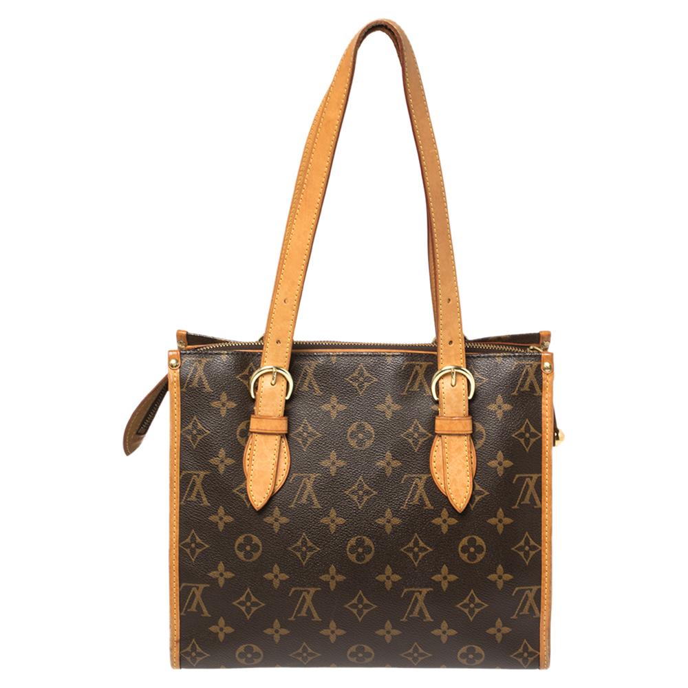 Gorgeous and handy, this Popincourt Haut bag by Louis Vuitton will delight your bag collection! The bag has been crafted from the signature Monogram canvas and features two leather handles. It has a top zipper that opens up to a canvas-lined