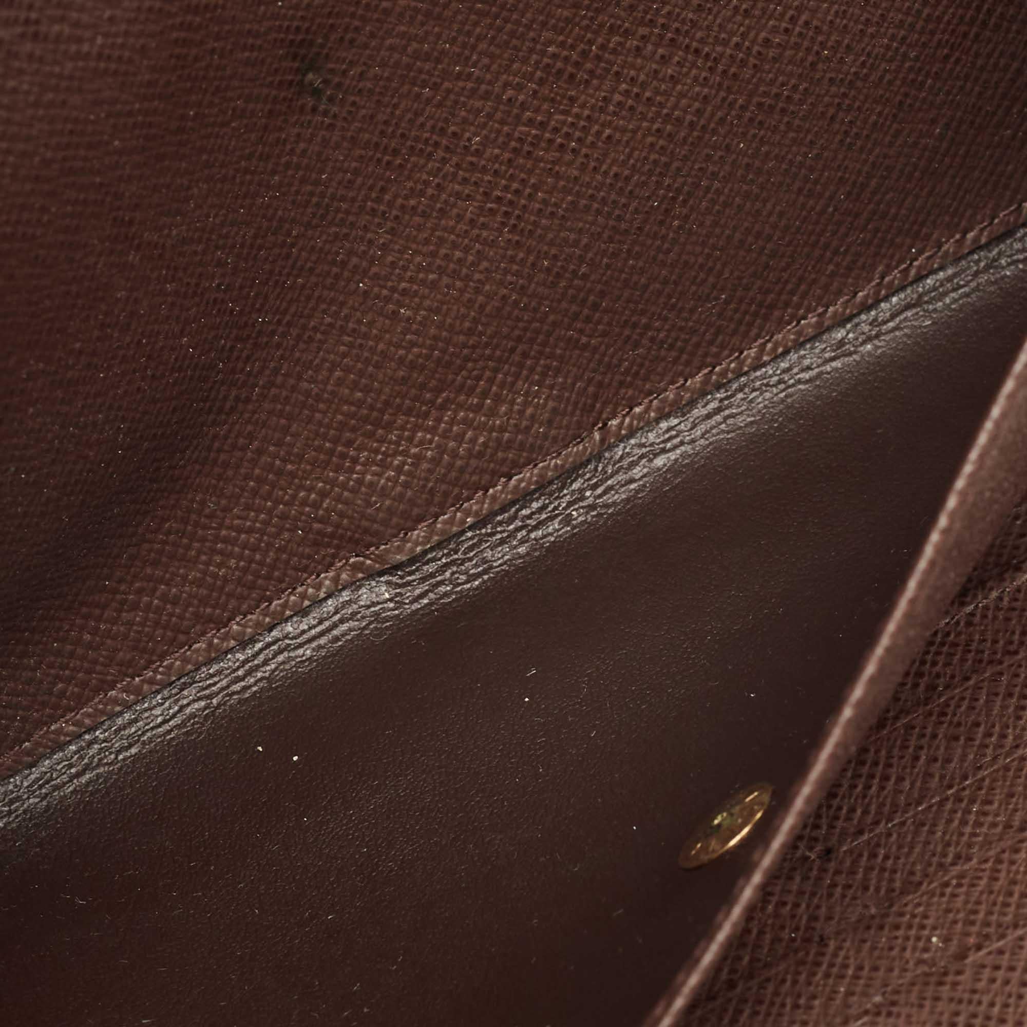 Marrone Portafoglio internazionale Louis Vuitton Monogram in tela Porte-Tresor in vendita