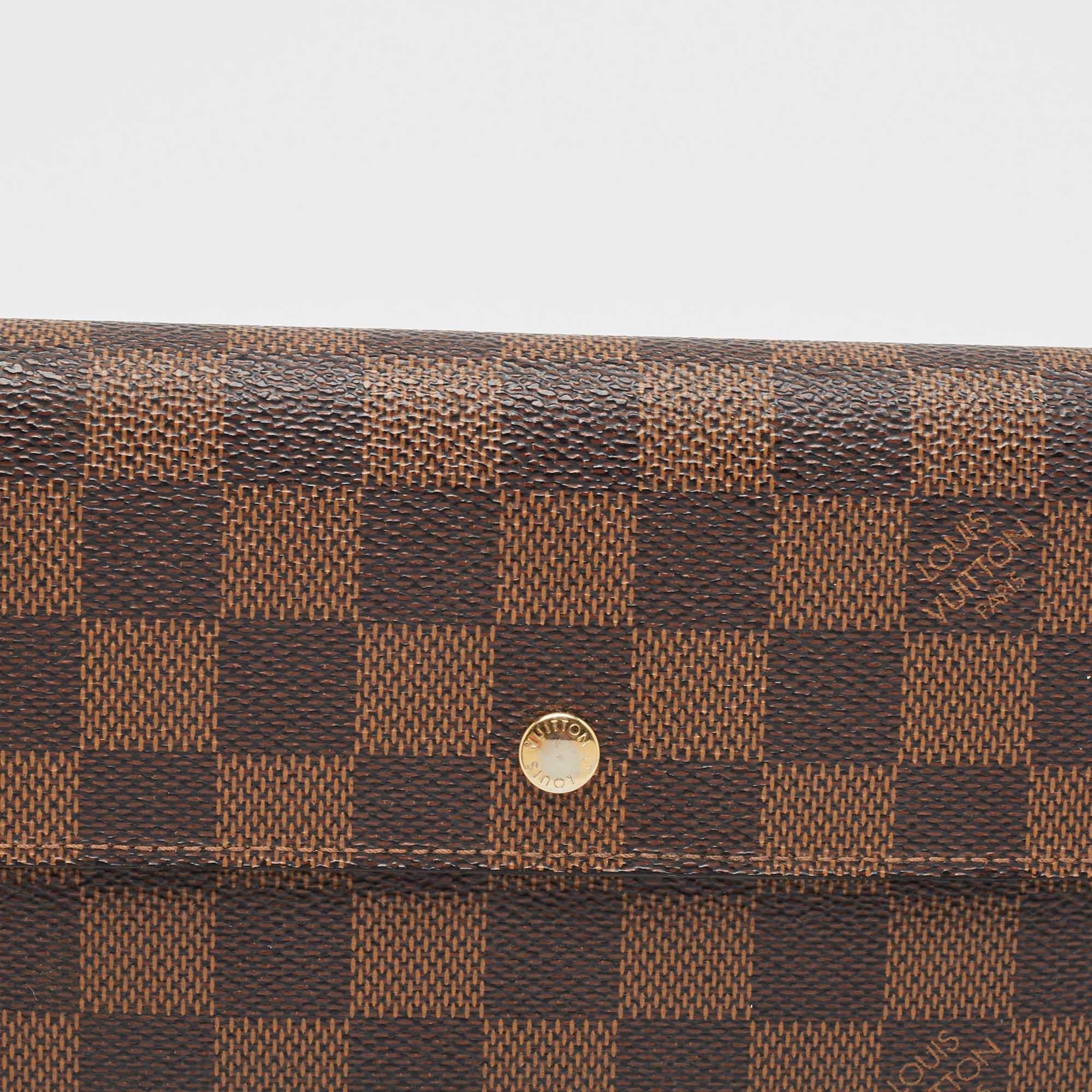 Portafoglio internazionale Louis Vuitton Monogram in tela Porte-Tresor in vendita 1
