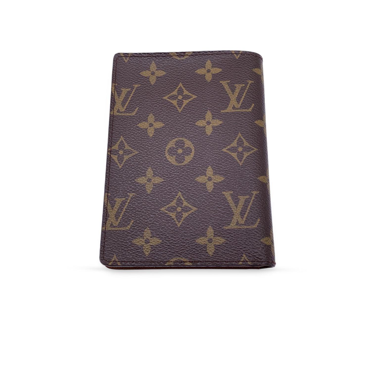 Louis Vuitton brown monogram canvas Portfoil 3 Vue wallet/document holder. Inside it has 6 credit card slots and 2 slots inside with plastic windows. 1 bill compartment. 'LOUIS VUITTON Paris - Made in France' embossed inside. Authenticity serial