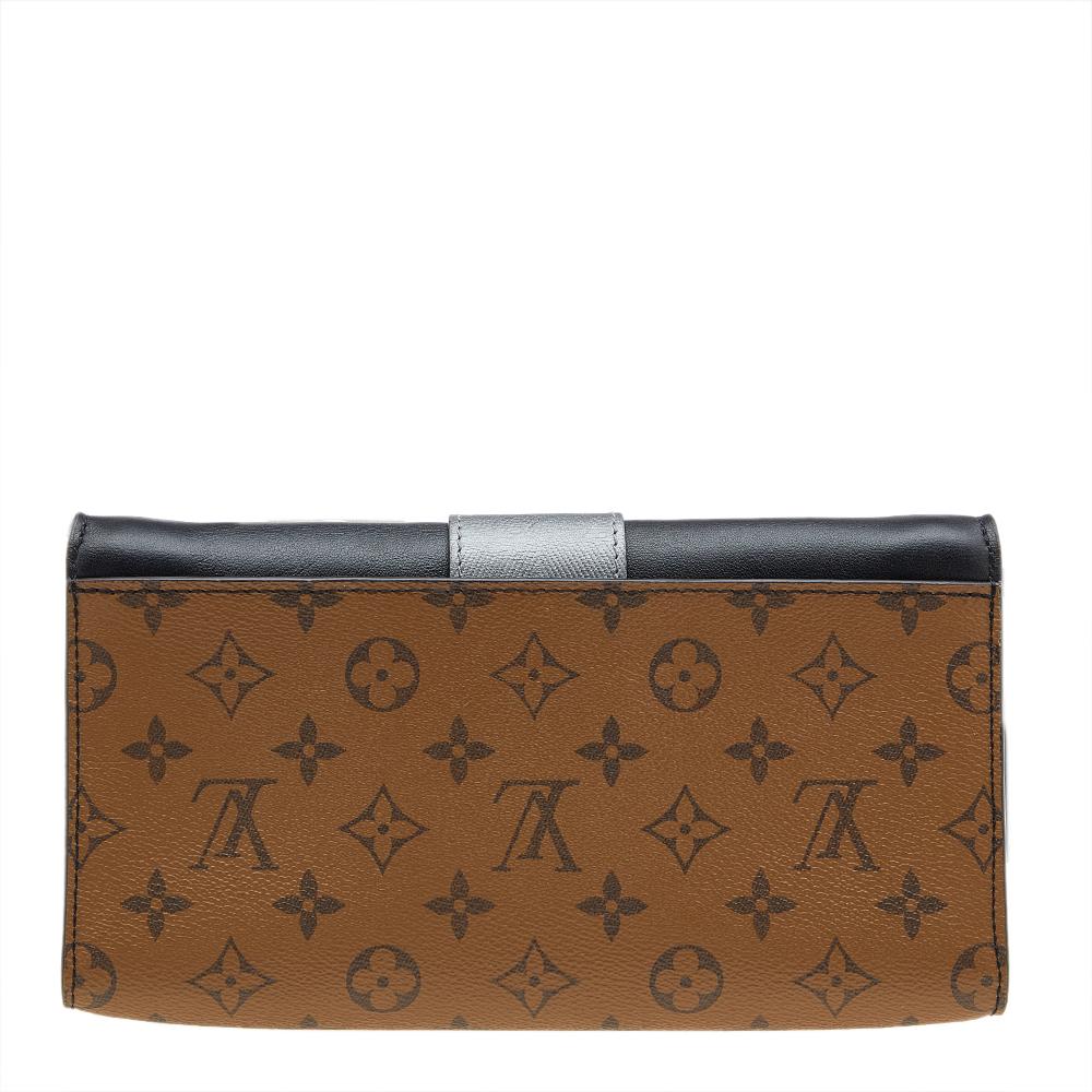 Beautifully sewn, this Louis Vuitton Pochette Column will be your new favourite. Its Reverse Monogram canvas and black leather exterior is designed with a front column accent. The flap opens to a leather-lined interior.