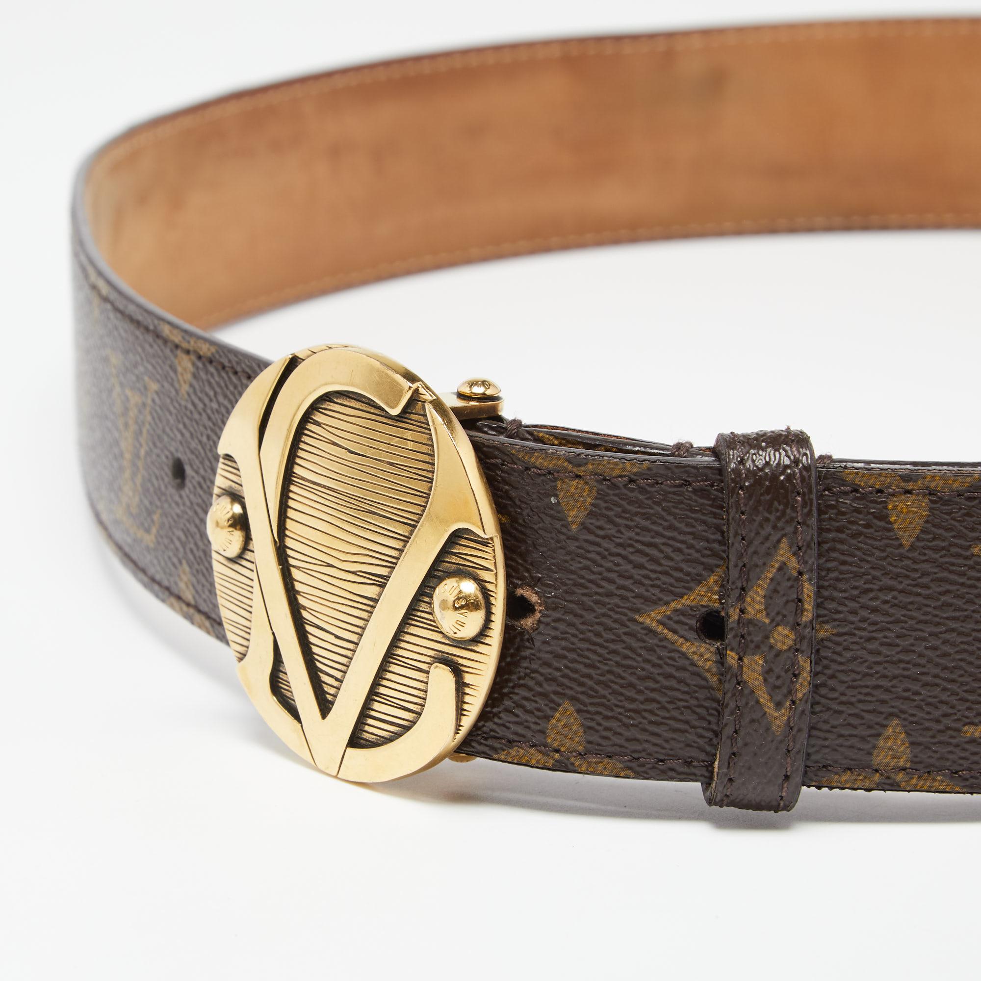 Add a luxe twist to your attire with this belt from Louis Vuitton. Made from monogram canvas, this belt comes with a complementing gold-tone 'LV' logo plaque and a single loop. It is durable and stylish.

Includes: Original Dustbag