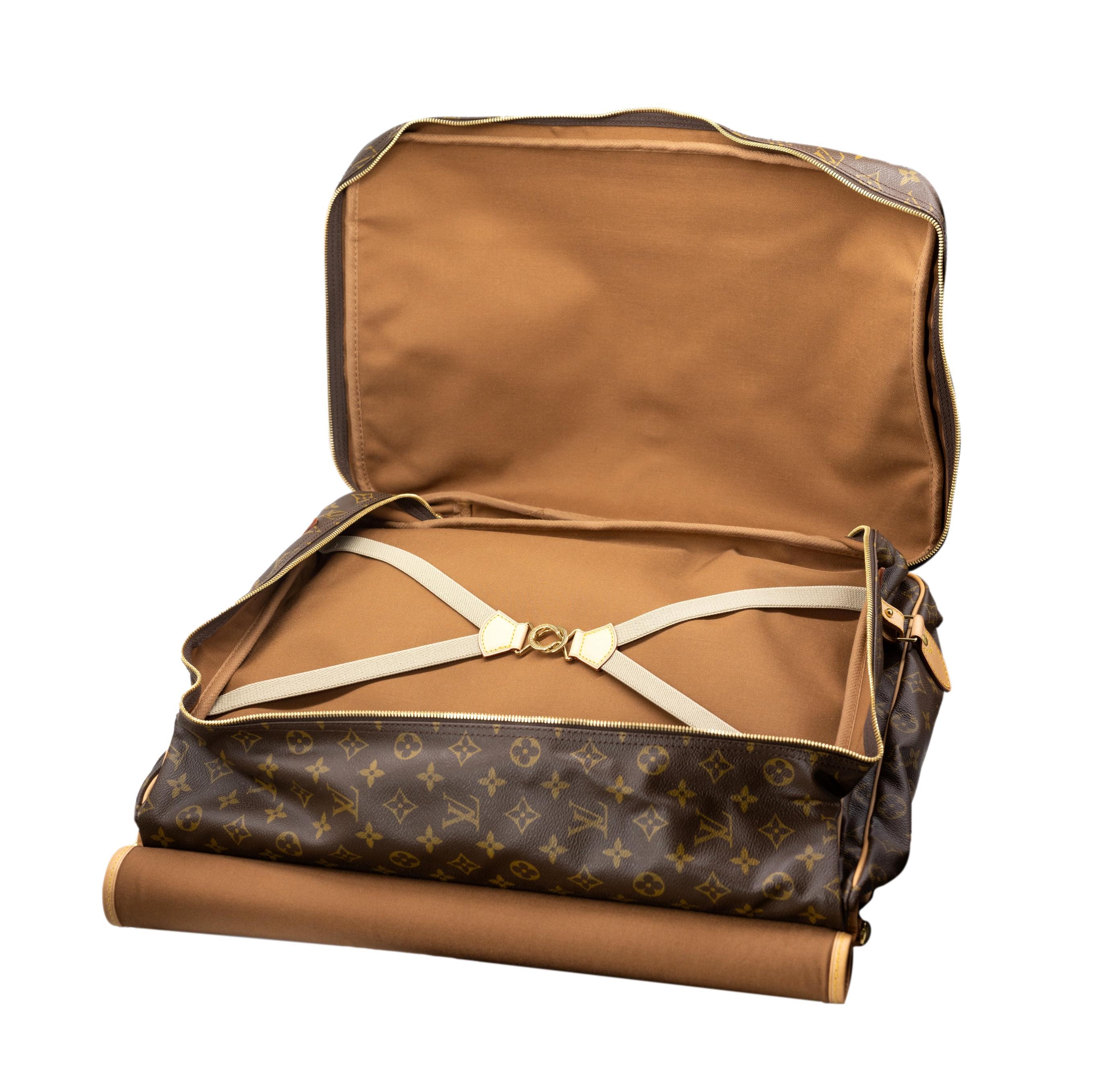 Louis Vuitton Monogram Canvas Sac Chasse Hunting Bag, France 2010. This iconic sac chasse hunting bag, a version of Louis Vuittons luggage collection which was first introduced in the 1930's by Gaston Vuitton as the city alternative to the original