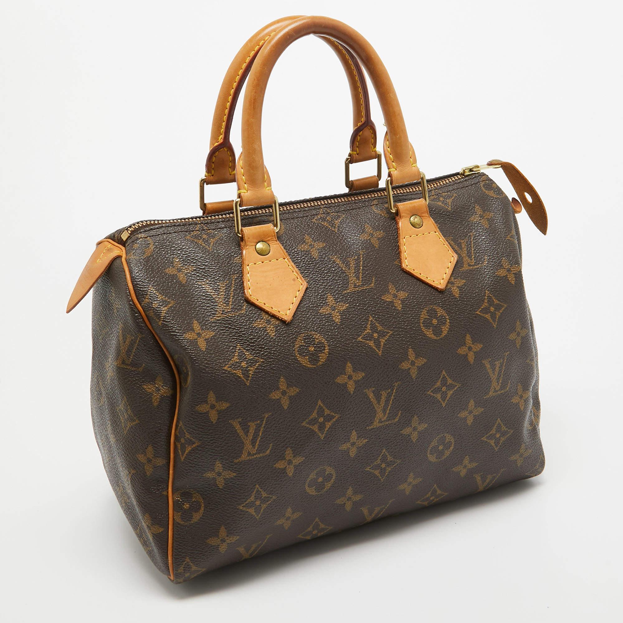 Louis Vuitton Monogrammierte Speedy 25 Tasche aus Segeltuch Damen im Angebot