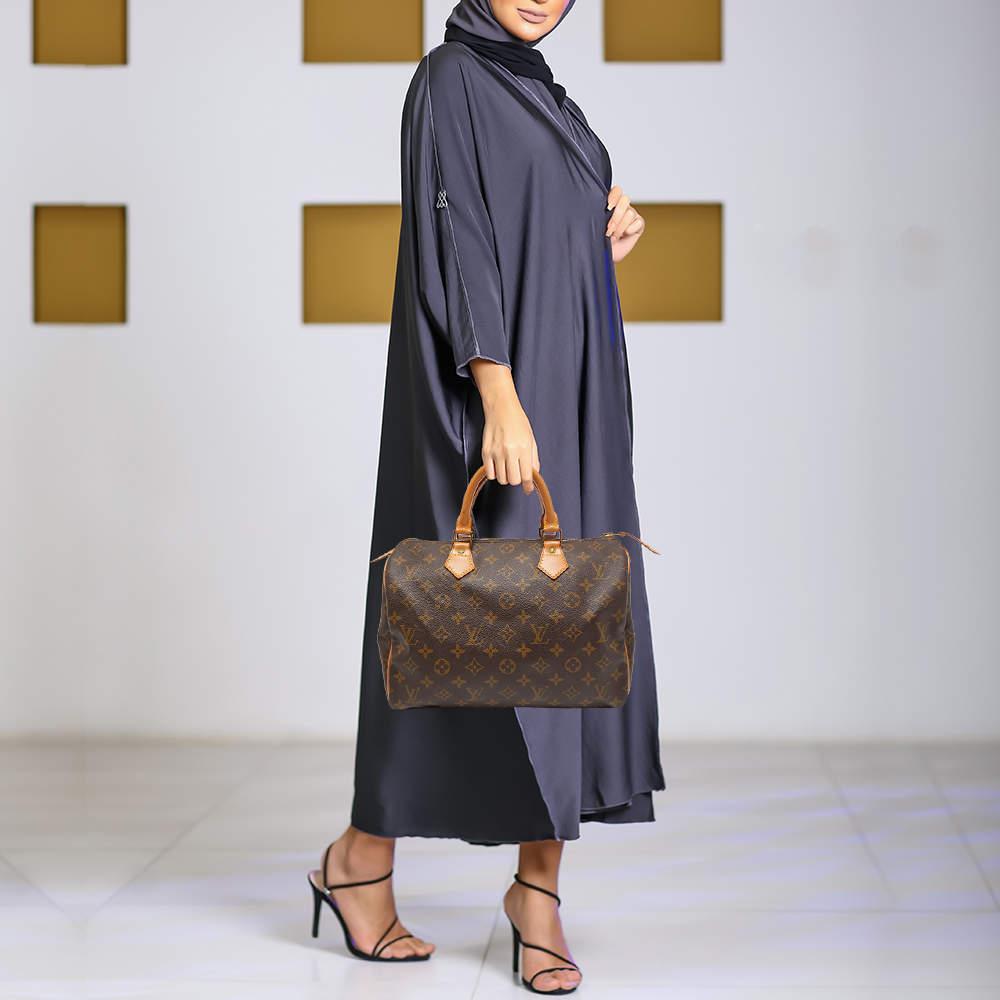 Louis Vuitton Monogrammierte Speedy 30 Tasche aus Segeltuch im Zustand „Gut“ in Dubai, Al Qouz 2