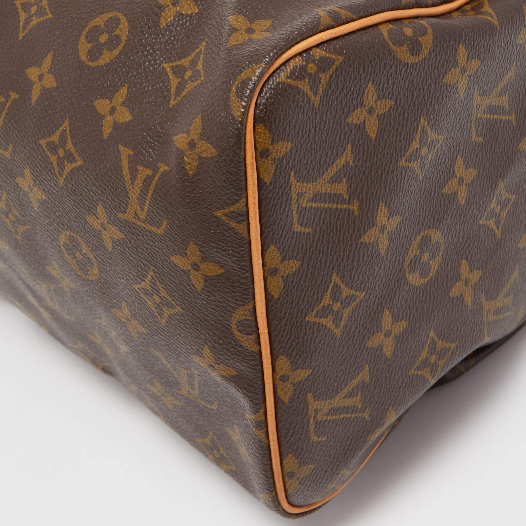Louis Vuitton Monogrammierte Speedy 30 Tasche aus Segeltuch 5