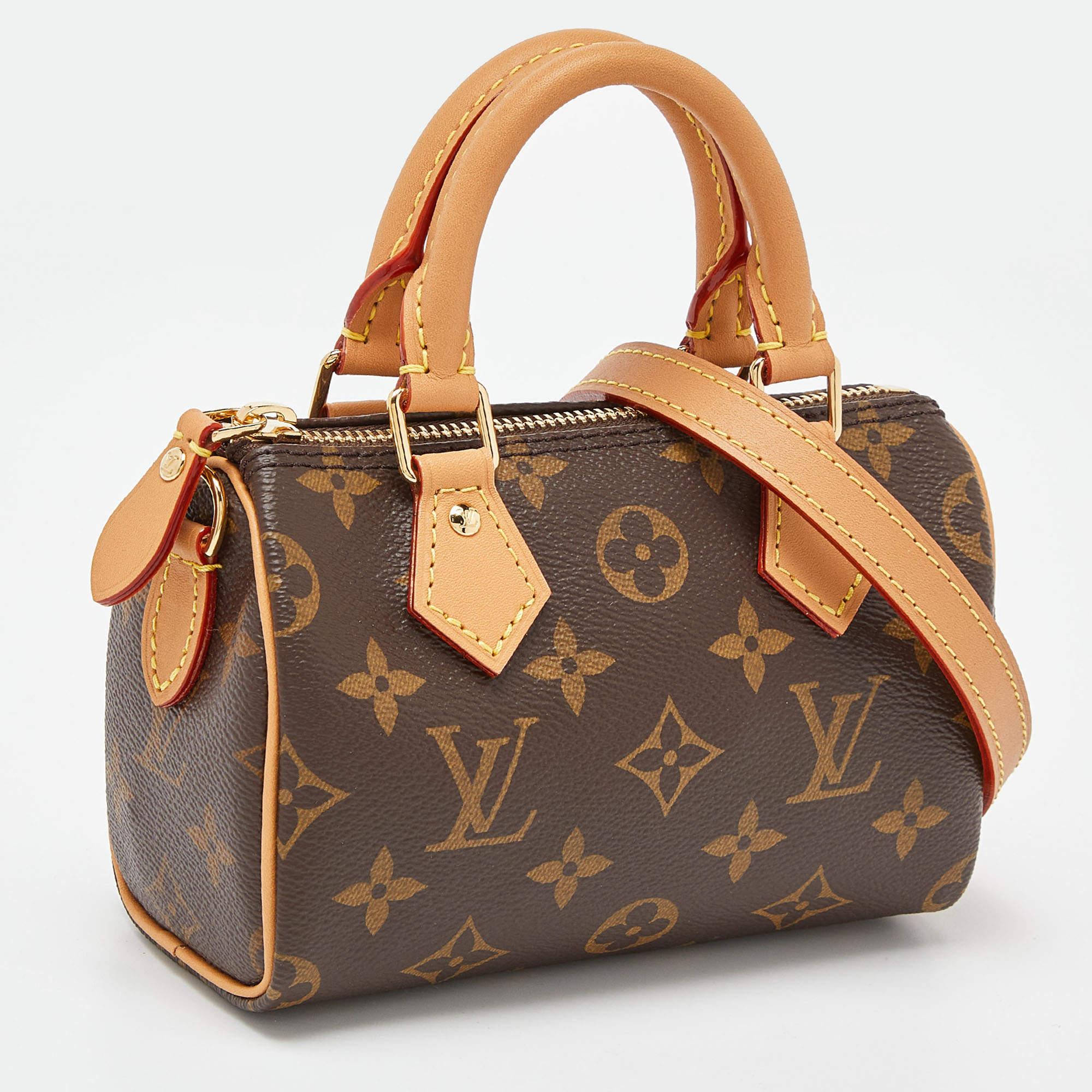 Highlight your look with this LV Nano Speedy bag. It is constructed using monogram canvas and leather into a sized-down version to be light and handy. The bag is added with gold-tone hardware and lined with canvas.

