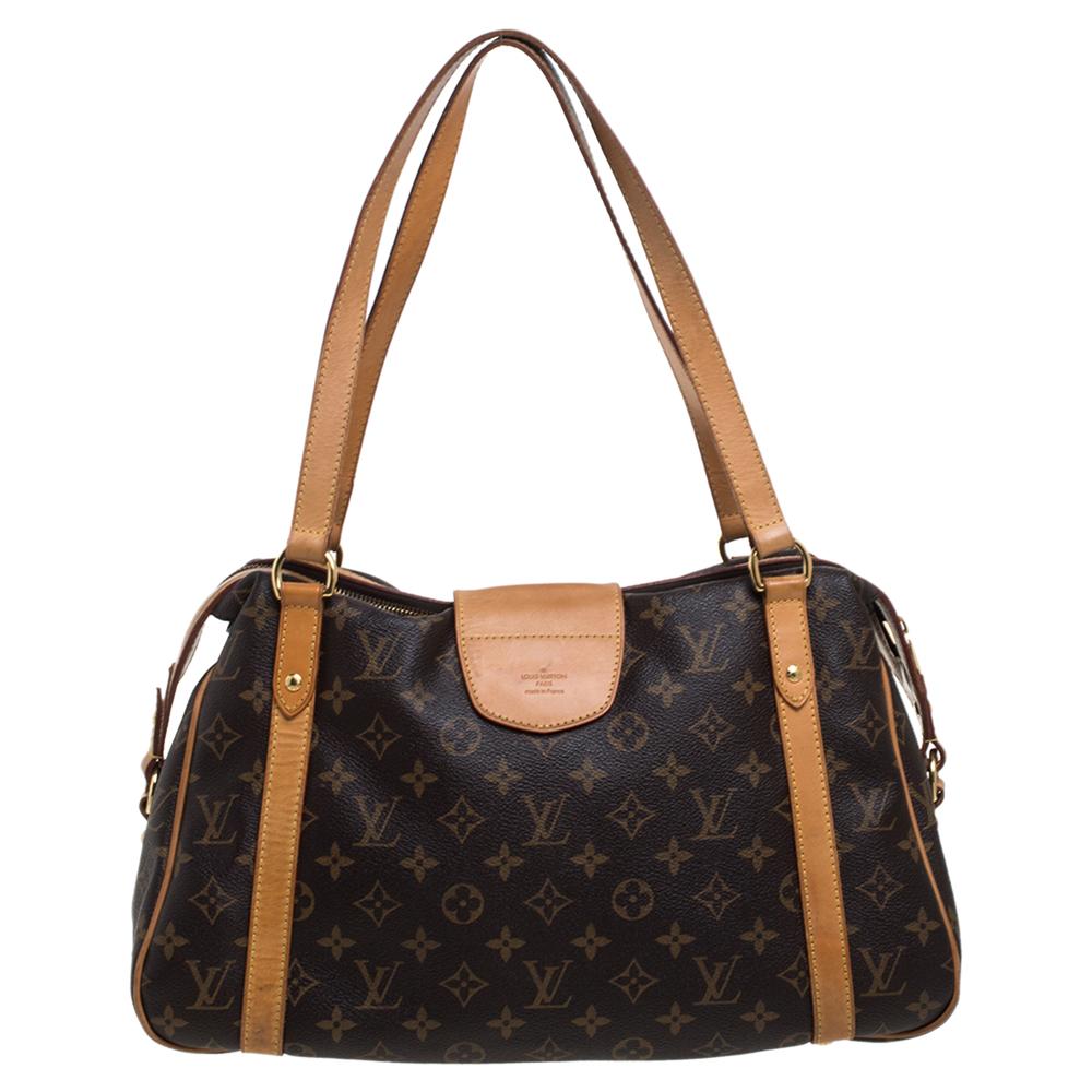 This Stresa PM by Louis Vuitton will add ease to your daily routine. Crafted from monogram canvas with tan leather trims and piping, it features a top zipper closure, dual handles, and polished gold-tone hardware. The canvas-lined interior has ample