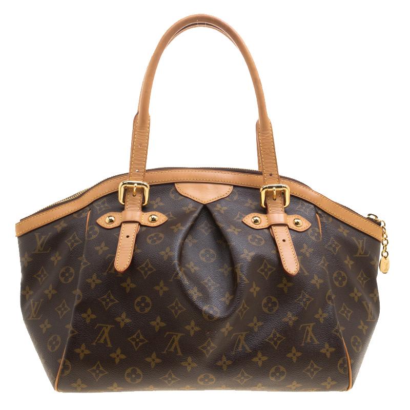 Everybody wants a handbag as good as this one. From the house of Louis Vuitton comes this gorgeous Tivoli GM bag that is both stylish and handy. Crafted from their signature Monogram canvas, the bag has two sturdy leather handles, protective metal