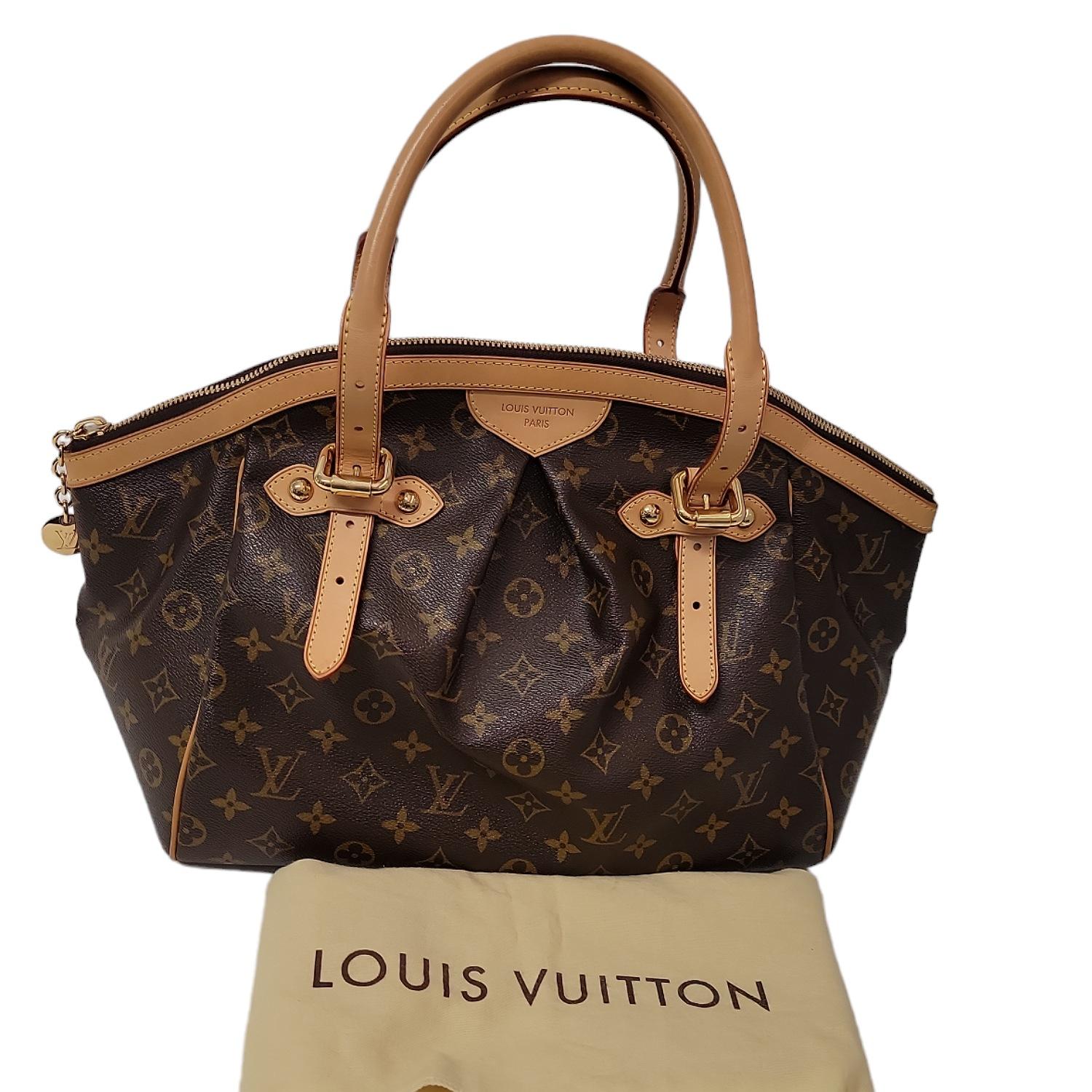 This unique Louis Vuitton Monogram Canvas Tivoli GM Bag is the one for you. The Tivoli, whose name was inspired by the famous city of Tivoli, Italy, features stylish details such as an inverted pleating, a frame top and a gold-tone zipper LV pull.