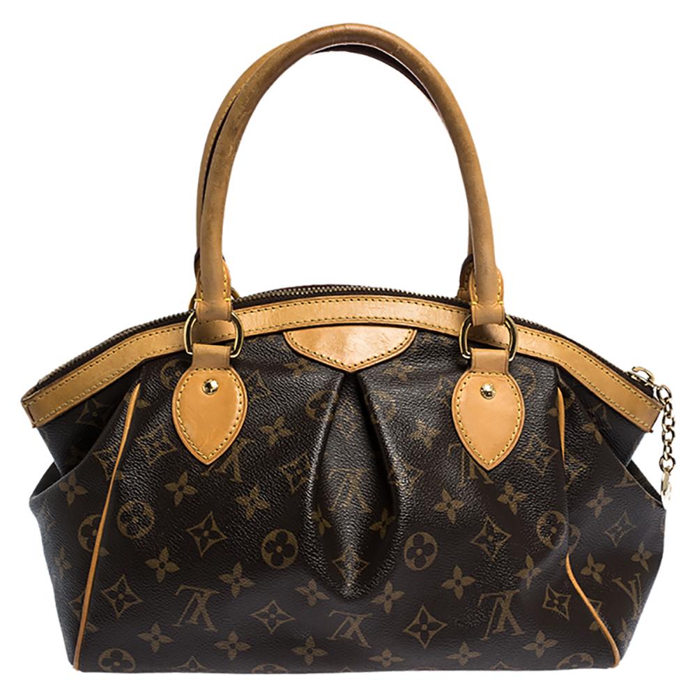 Everybody wants a handbag as good as this one. From the house of Louis Vuitton comes this gorgeous Tivoli bag that is both stylish and handy. Crafted from their signature monogram coated canvas, the bag has two sturdy leather handles and protective
