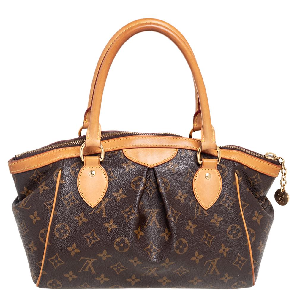 Everybody wants a handbag as good as this one. From the house of Louis Vuitton comes this gorgeous Tivoli PM bag that is both stylish and handy. Crafted from their signature Monogram canvas, the bag has two sturdy leather handles and protective