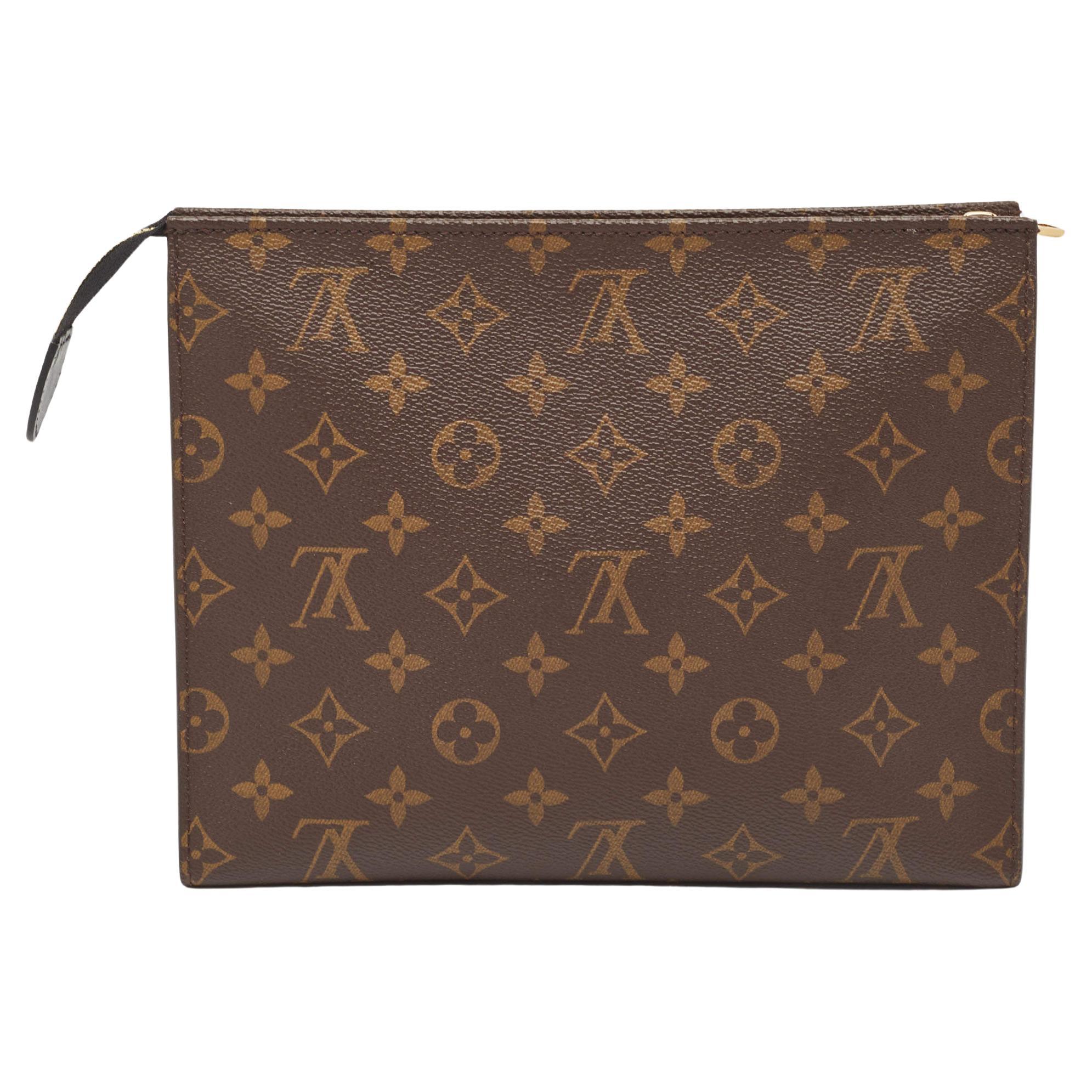 How do I put a strap on a Louis Vuitton wristlet?