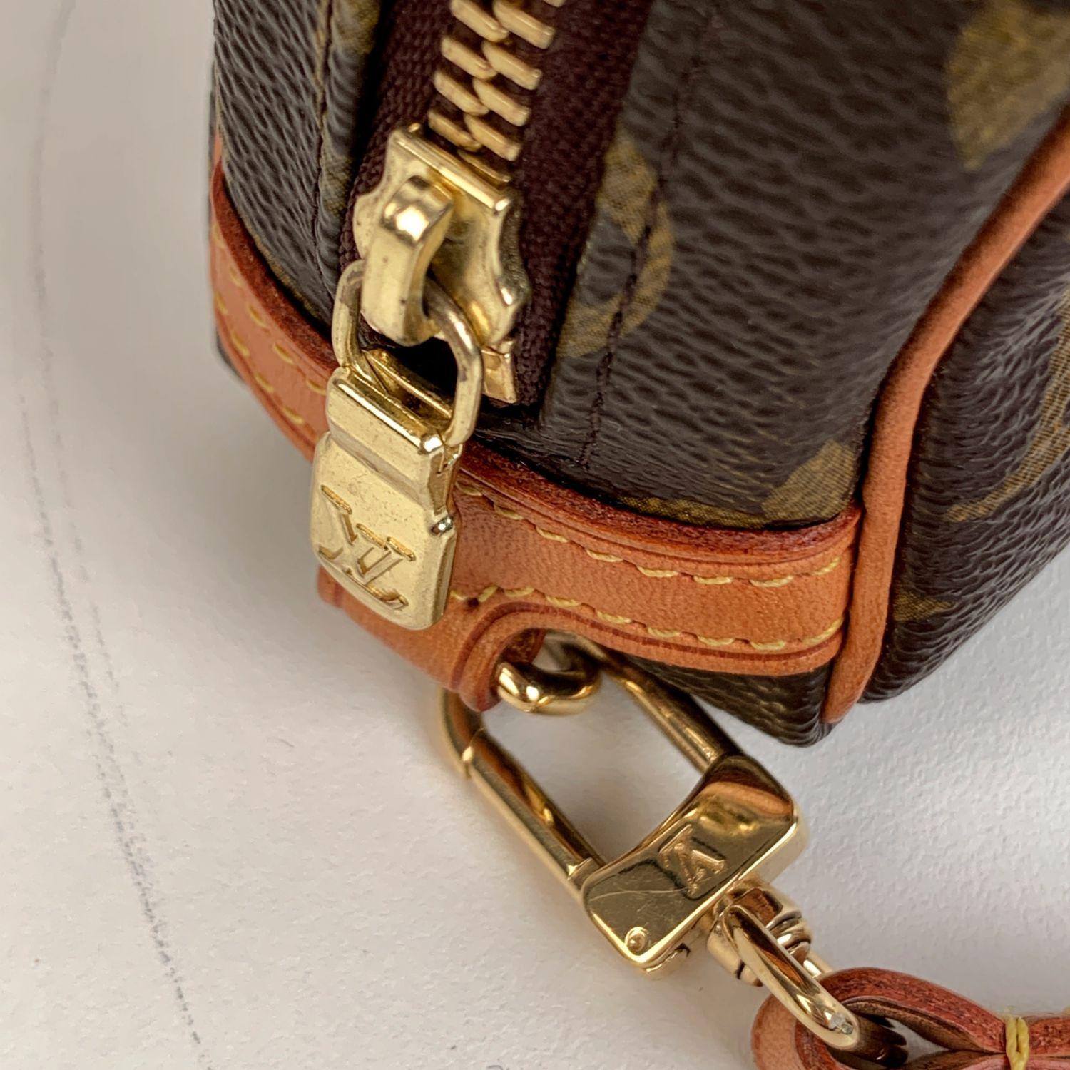 louis vuitton pouch with wrist strap