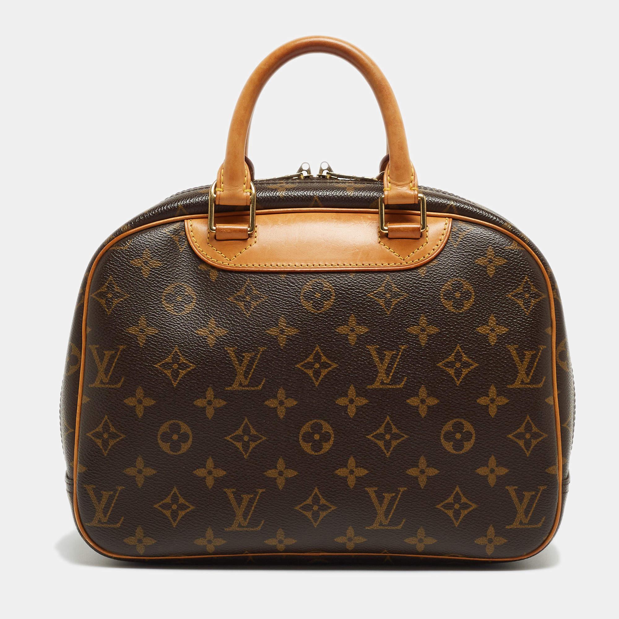 Louis Vuitton's handbags are popular owing to their high style and functionality. This bag, like all their designs, is durable and stylish. Exuding a fine finish, the LV Trouville bag is designed to give a luxurious experience. The interior has