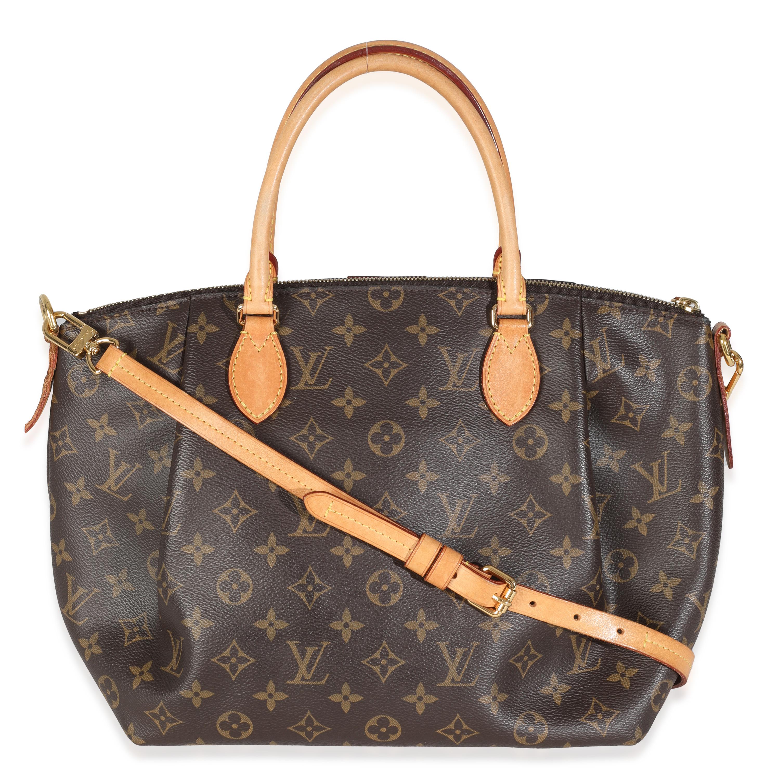 Listing Title: Louis Vuitton Monogram Canvas Turenne MM
SKU: 146880
Condition: Pre-owned 
Handbag Condition: Good
Condition Comments: Item is in good condition with apparent signs of wear. Patina along leather and wear along corners. Scratching