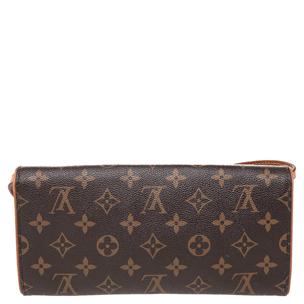 Handy and stylish, this pochette is from the house of Louis Vuitton. It has been crafted from signature monogram canvas and comes with a front flap that reveals an Alcantara interior which will house the essentials you cannot do without. The