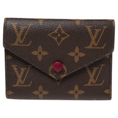 Louis Vuitton Monogrammiertes Segeltuch Victorine Brieftasche