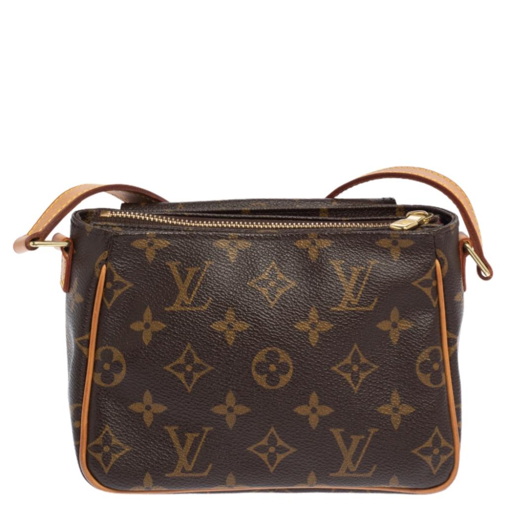 We all know Louis Vuitton is know for making bags that are exquisite and lasting. This Viva Cite is a beauty like all the others. It comes crafted from Monogram canvas and designed distinctly with contrast piping, two front pockets and a well-sized