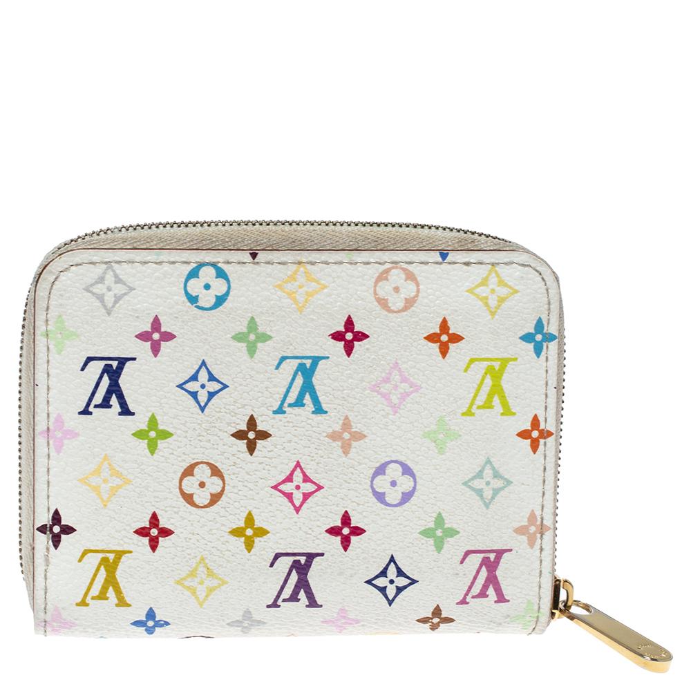 This Louis Vuitton Zippy coin purse is conveniently designed for everyday use. Crafted from colorful monogram coated canvas, the wallet has a zip closure that opens to reveal multiple slots for you to neatly arrange your coins.

