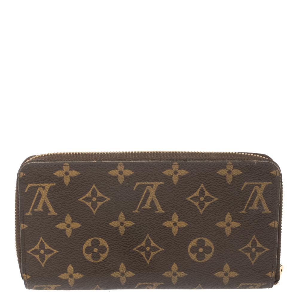 This Louis Vuitton Zippy wallet is conveniently designed for everyday use. Crafted from monogram coated canvas, the wallet has zip closure that opens to reveal multiple slots, Leather-lined compartments and a zip pocket for you to neatly arrange