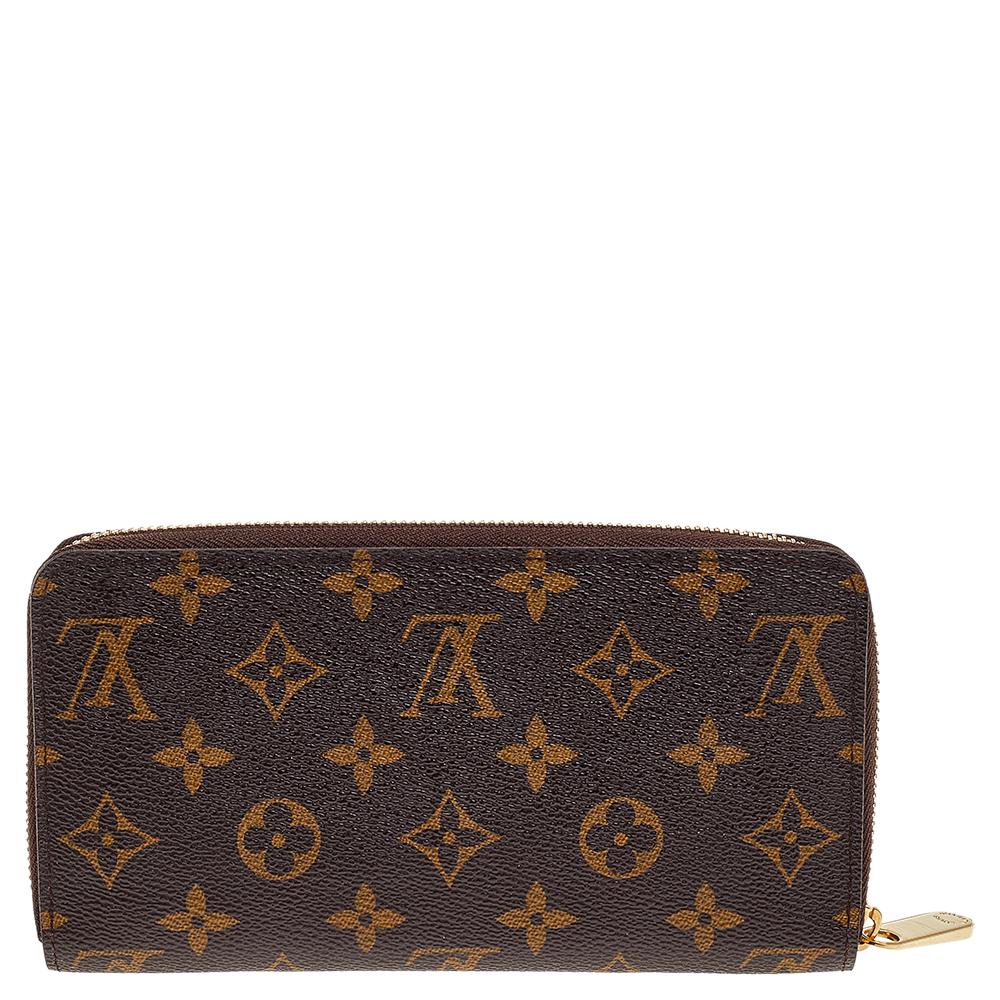 This Louis Vuitton Zippy wallet is conveniently designed for everyday use. Crafted from monogram coated canvas, the wallet has zip closure that opens to reveal multiple slots, leather-lined compartments and a zip pocket for you to neatly arrange