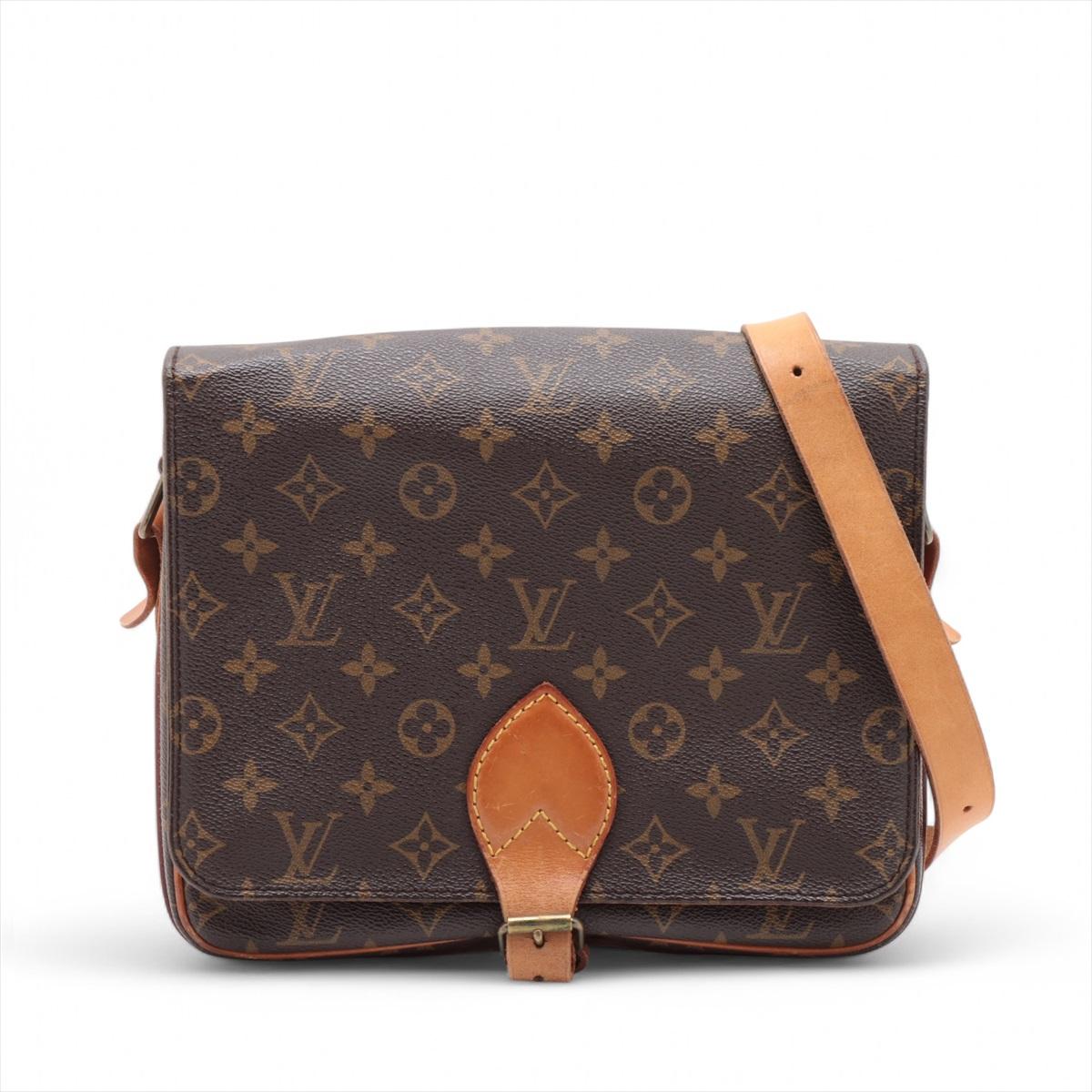 *will ship about 4/22

The Louis Vuitton Monogram Cartouchière is a classic and versatile crossbody bag that embodies the brand's timeless style. Featuring the iconic Monogram canvas, it combines elegance with practicality. The bag is designed with
