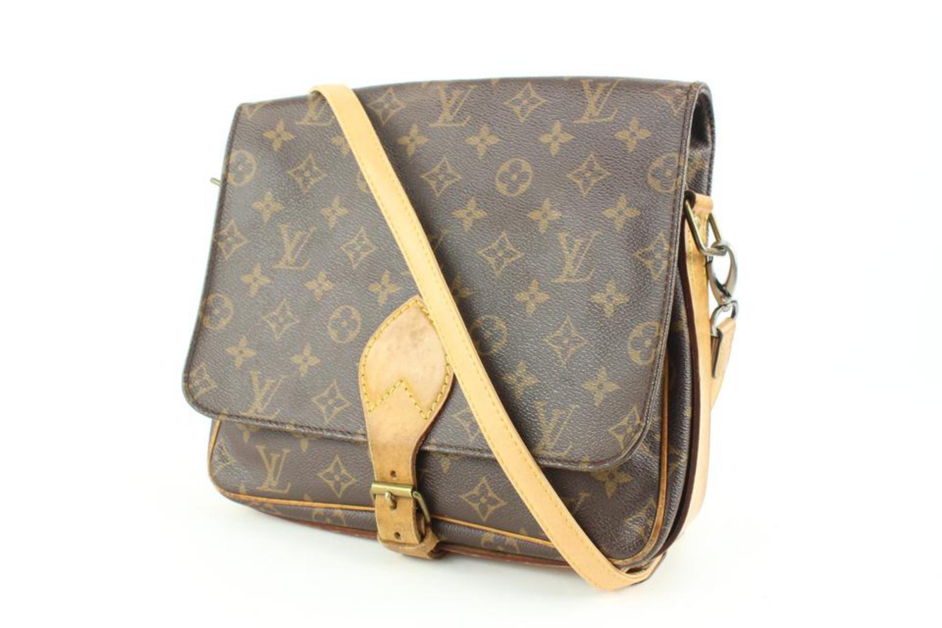 Louis Vuitton Monogram Cartouchiere GM Crossbod Bag 113lv42
Date Code/Serial Number: 8912 SL
Made In: France
Measurements: Length:  9.5