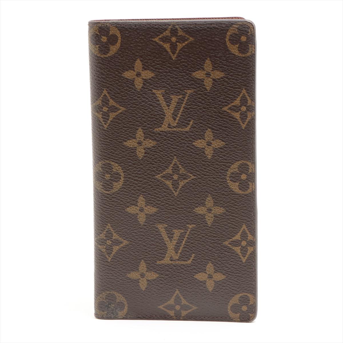 The Louis Vuitton Monogram Checkbook Long Wallet is a sophisticated and practical accessory that seamlessly blends iconic design with functionality. Crafted from the classic Monogram canvas, the wallet features the timeless LV pattern, reflecting