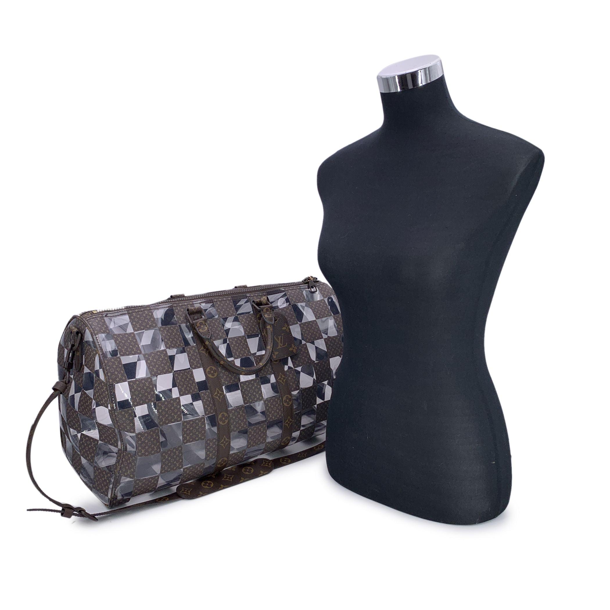 This beautiful item will come with a Certificate of Authenticity provided by Entrupy. The certificate will be provided at no further cost From the final collections of the legendary Virgil Abloh at Louis Vuitton, this Keepall 50 Bandoulière Monogram