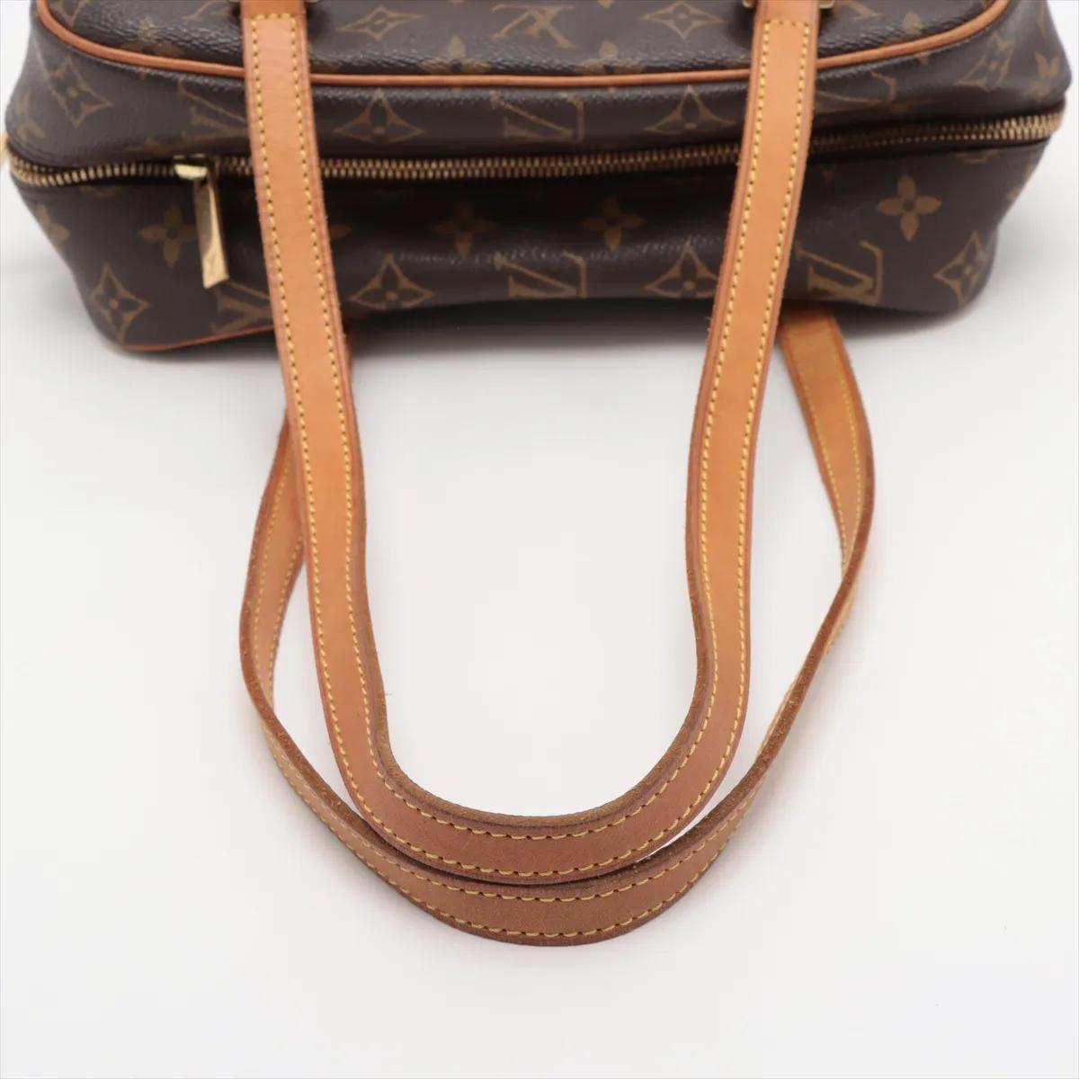 *Louis Vuitton Monogram Cite MM Bon état - En vente à Humacao, PR