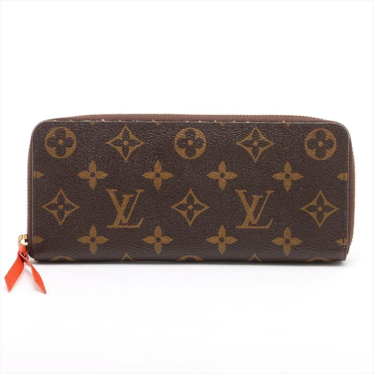 Il portafoglio Monogram Clemence di Louis Vuitton in marrone e arancione è un accessorio elegante e raffinato realizzato con l'iconica tela rivestita Monogram del marchio. La sua silhouette sottile e allungata è impreziosita da una sicura chiusura a