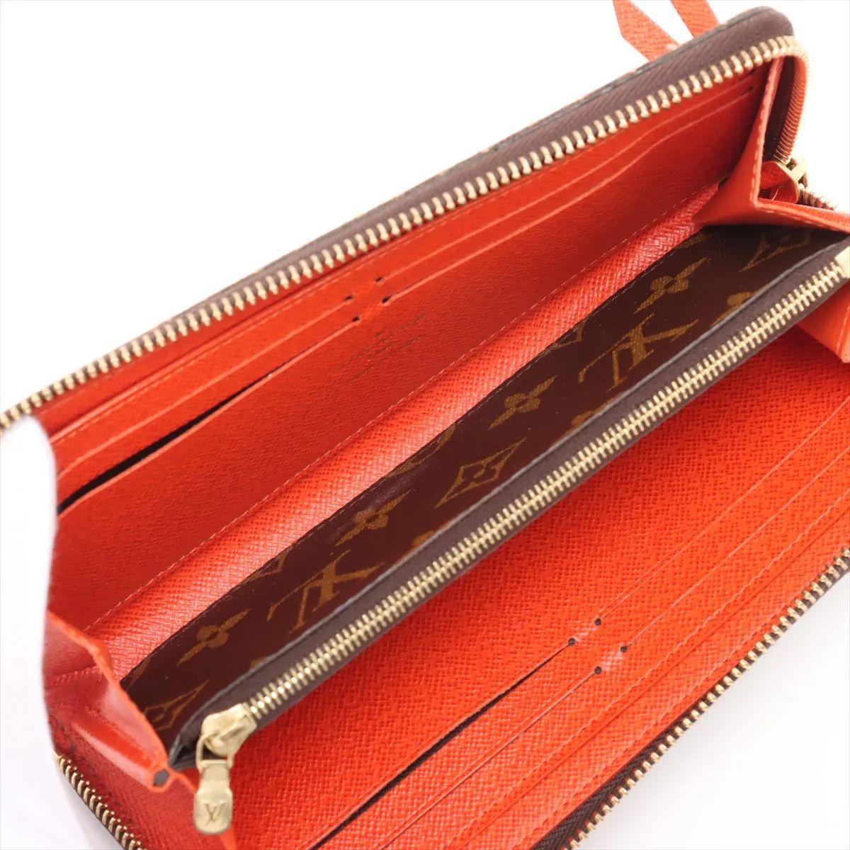 Donna Louis Vuitton Portafoglio Monogram Clemence Marrone x Arancione in vendita