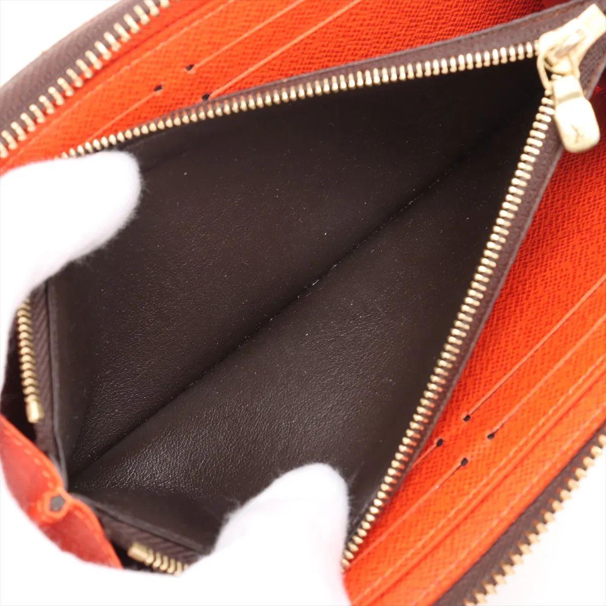 Louis Vuitton Portafoglio Monogram Clemence Marrone x Arancione in vendita 3