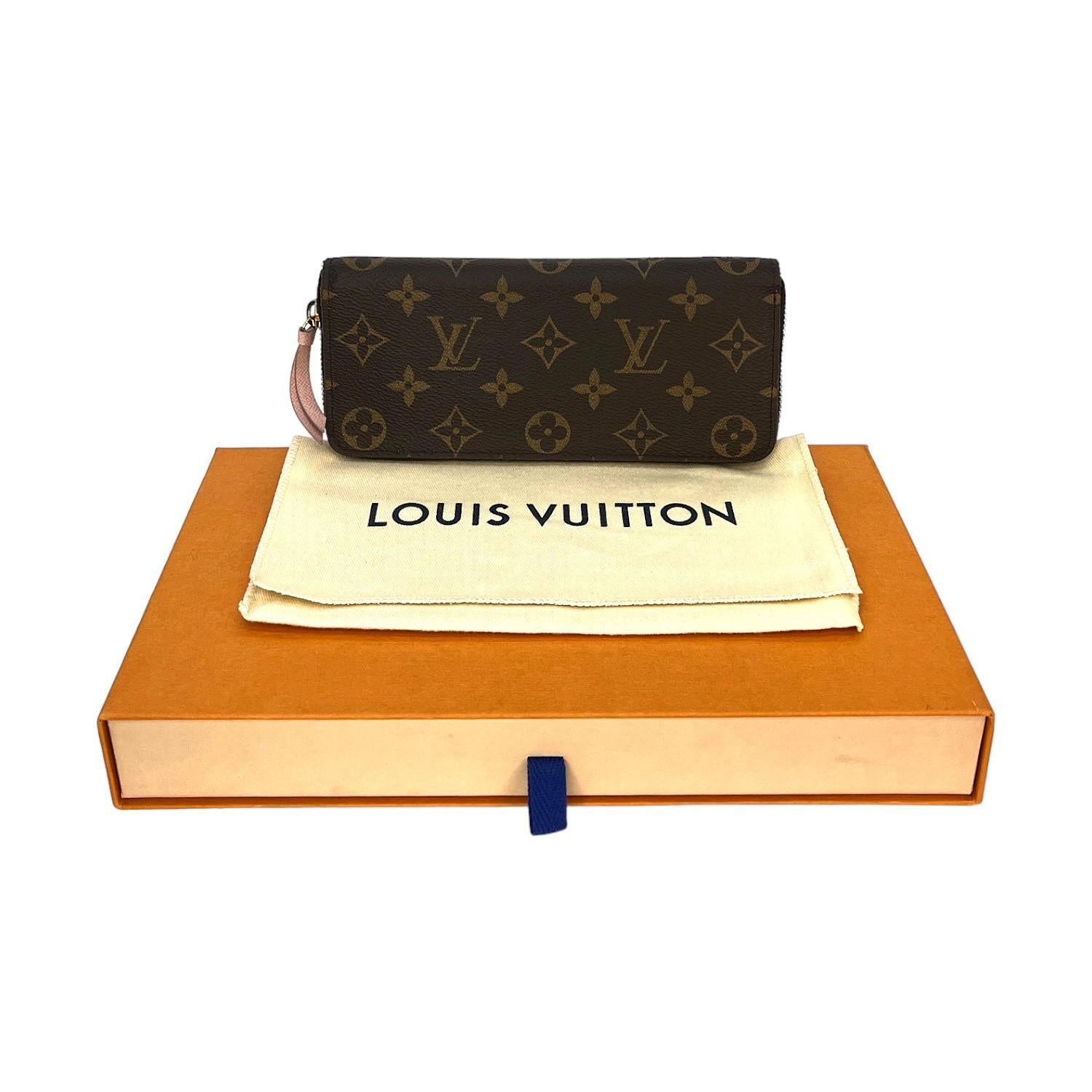 This Louis Vuitton Monogram Clemence Wallet is finely crafted of the iconic Louis Vuitton Monogram canvas exterior with leather trimming and gold-tone hardware features. It has a zipper closure that opens up to a pink leather interior with a zipper