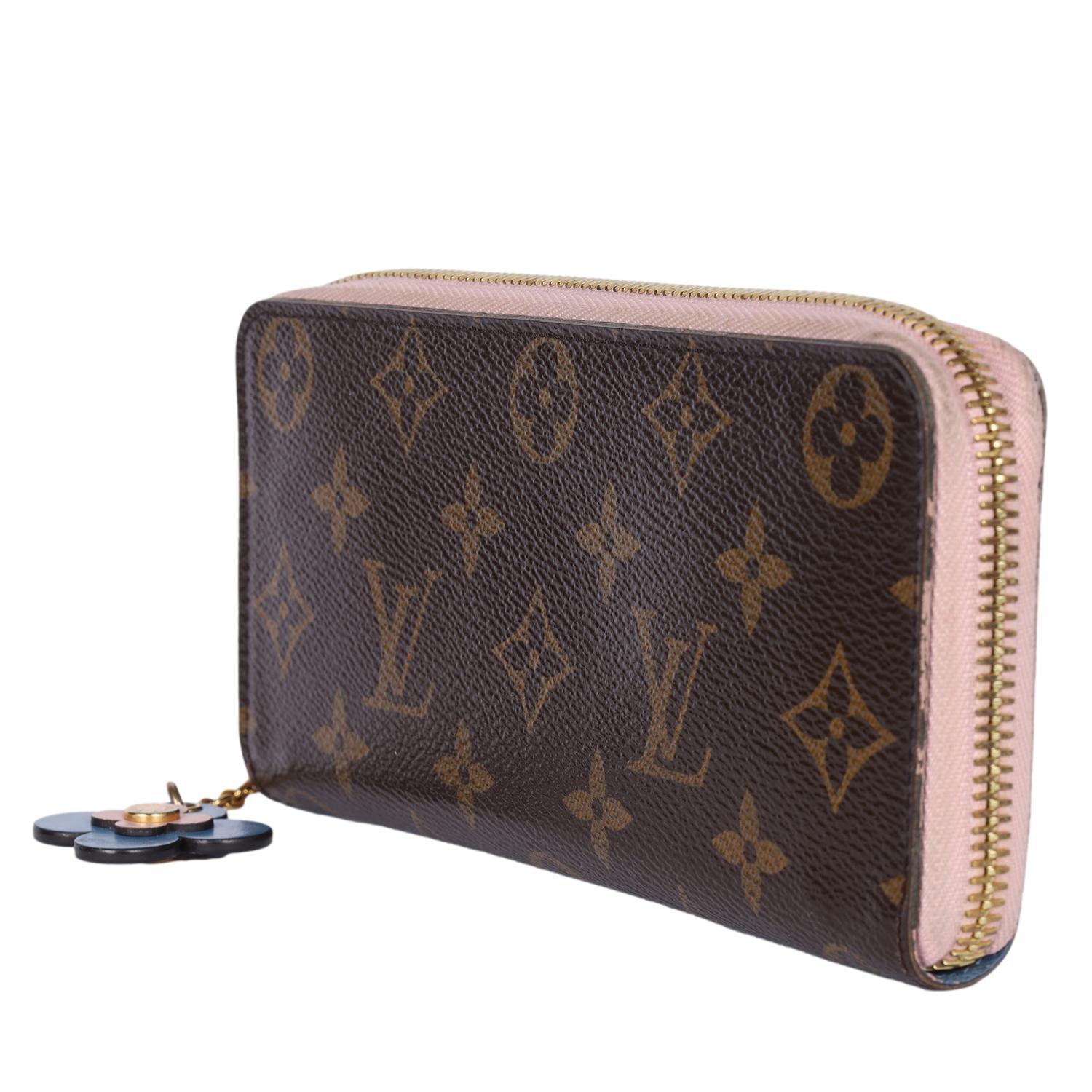Portafoglio Louis Vuitton Monogram Clemence con chiusura a cerniera LV a fiori In condizioni buone in vendita a Salt Lake Cty, UT