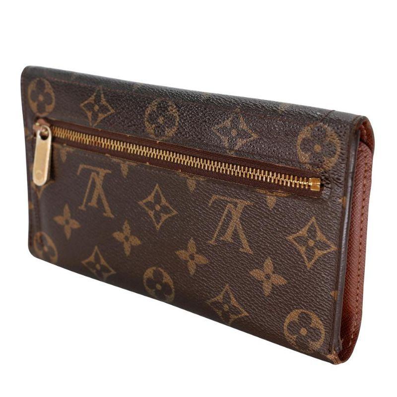 Louis Vuitton Monogram Coated Canvas GM Eugenie Wallet LV-W0209N-0010

This Louis Vuitton Monogram Canvas Eugenie Wallet is the most elegant way to organize your essentials such as your bills, papers, credit cards and plenty of coins. It features a