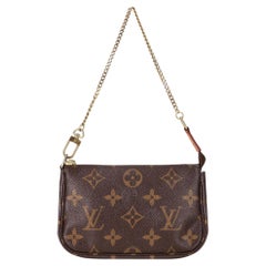 Louis Vuitton Monogram Coated Canvas Mini-Pochette-Tasche