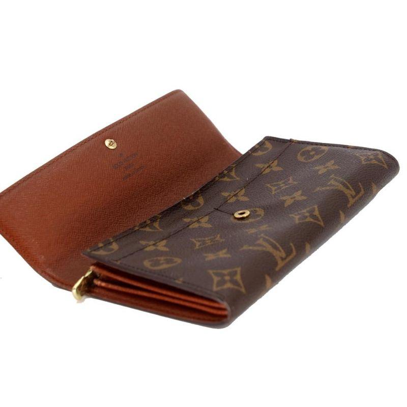 Nero Louis Vuitton Portafoglio continentale Sarah in tela rivestita con monogramma LV-1118P-0022 in vendita