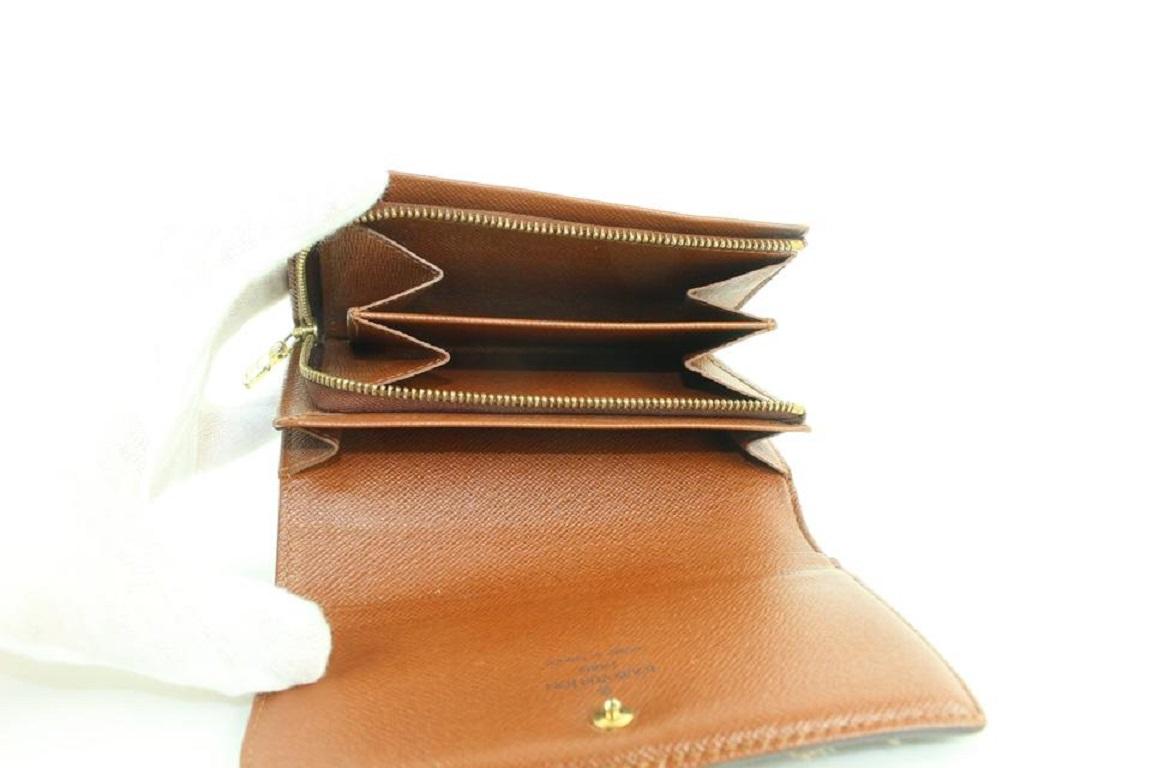 Louis Vuitton - Portefeuille compact à fermeture Éclair avec monogramme 144lvs430 Bon état - En vente à Dix hills, NY