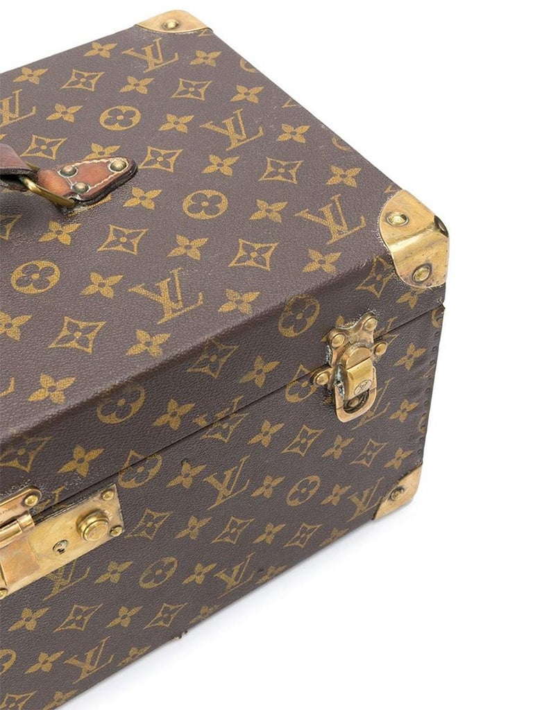 A Monogram Canvas Pégase 65 Suitcase with a Protective Cover. - Bukowskis