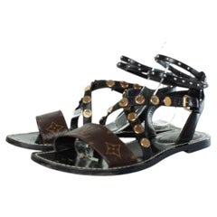 Louis Vuitton, Monogram criss cross sandals