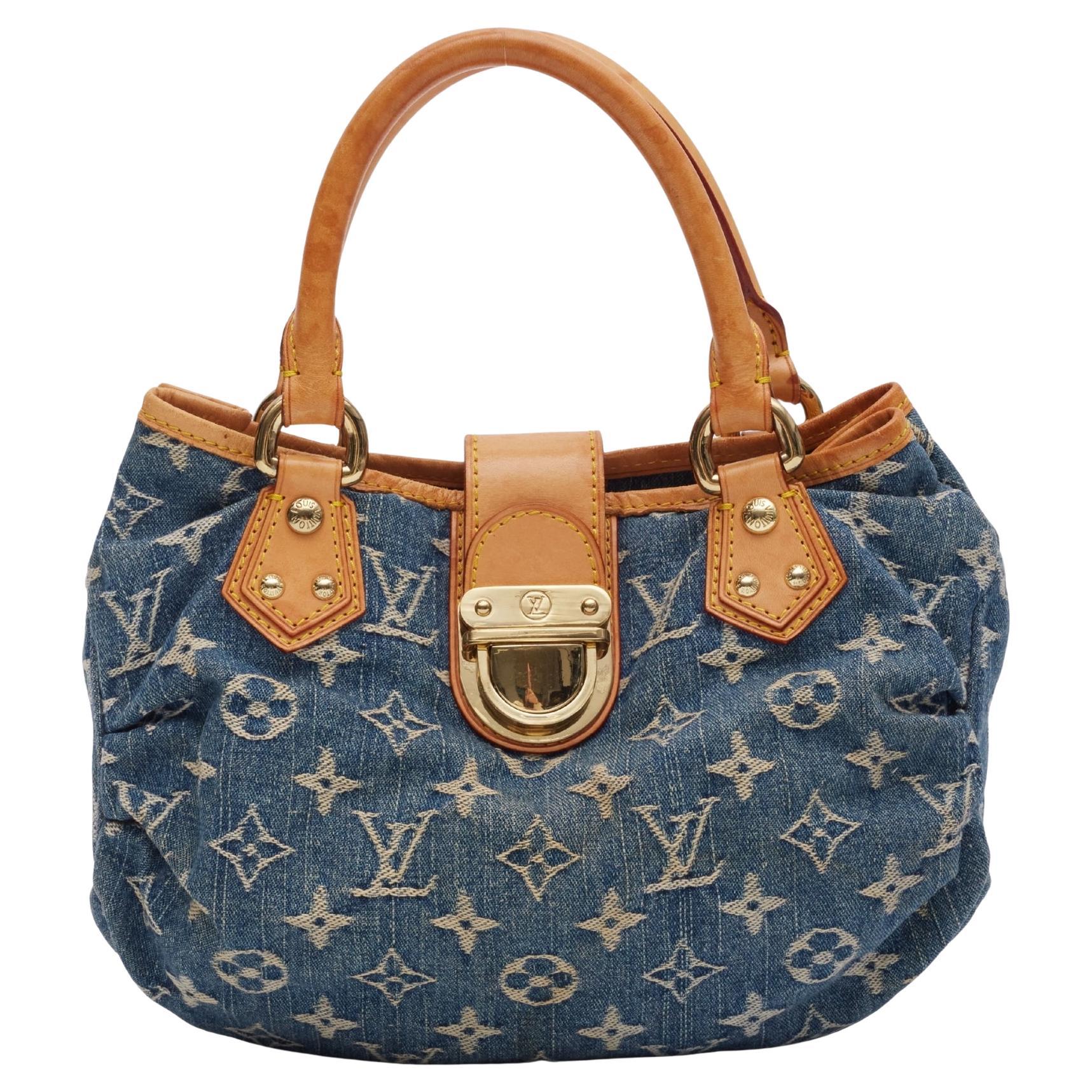 Who owns the Marc Jacobs brand?