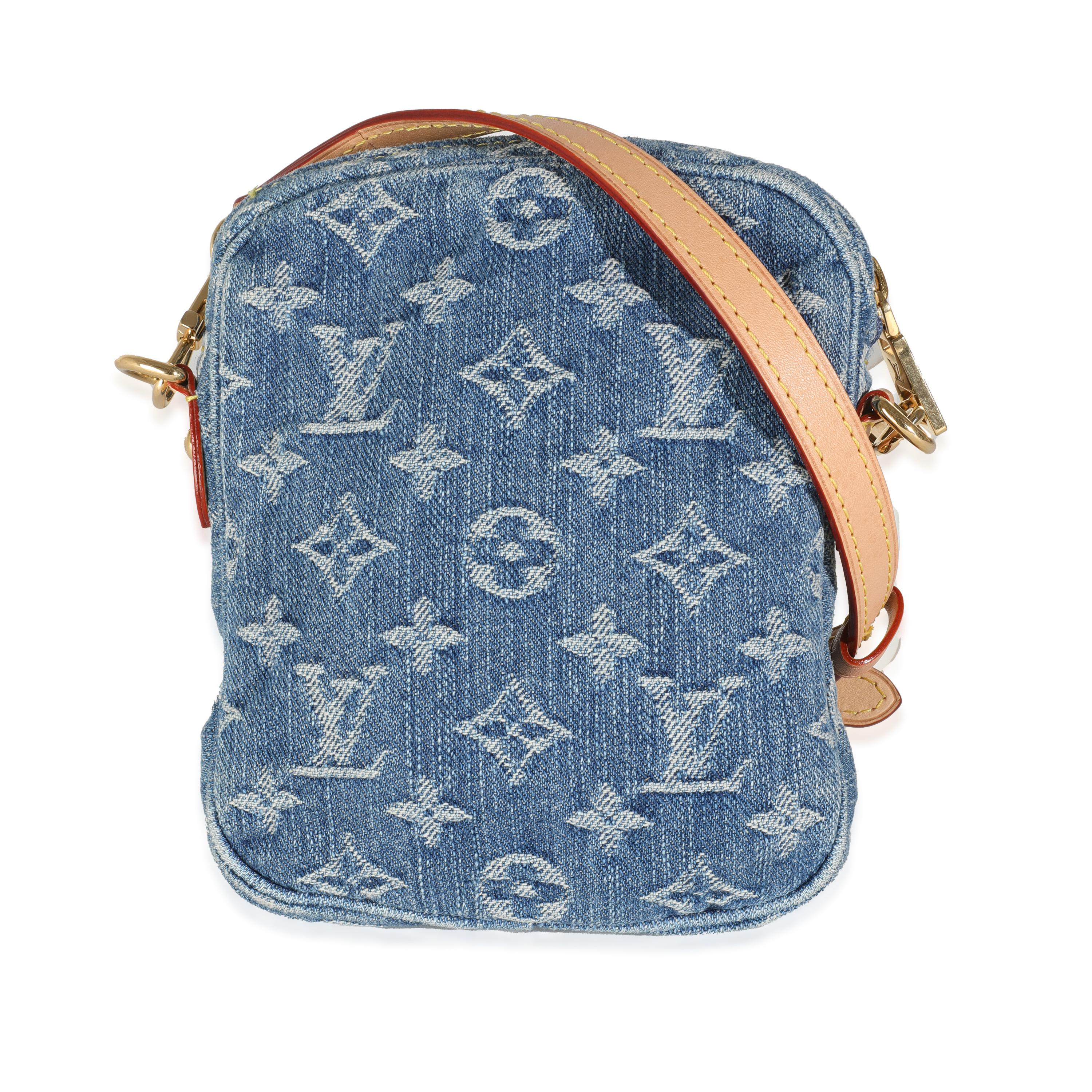 Listing Title: Louis Vuitton Monogram Denim Fairfax Pochette
SKU: Z144256
MSRP: 2150.00 USD
Condition: Pre-owned 
Handbag Condition: Excellent
Condition Comments: Item is in excellent condition and displays light signs of wear. Watermarks along