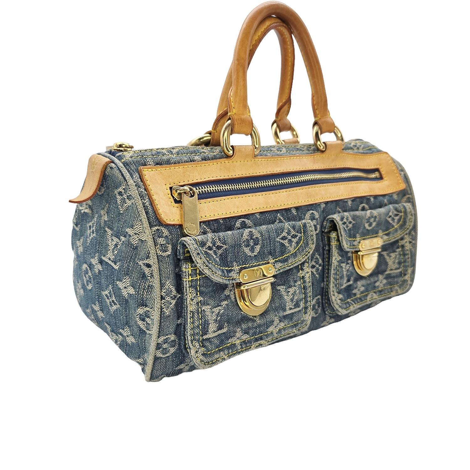 Experience timeless luxury with the Louis Vuitton Monogram Denim Neo Speedy Handbag. From the 2005 Collection by Marc Jacobs. This iconic bag, features the brand's signature monogram denim and soft, durable leather accents. The spacious interior is