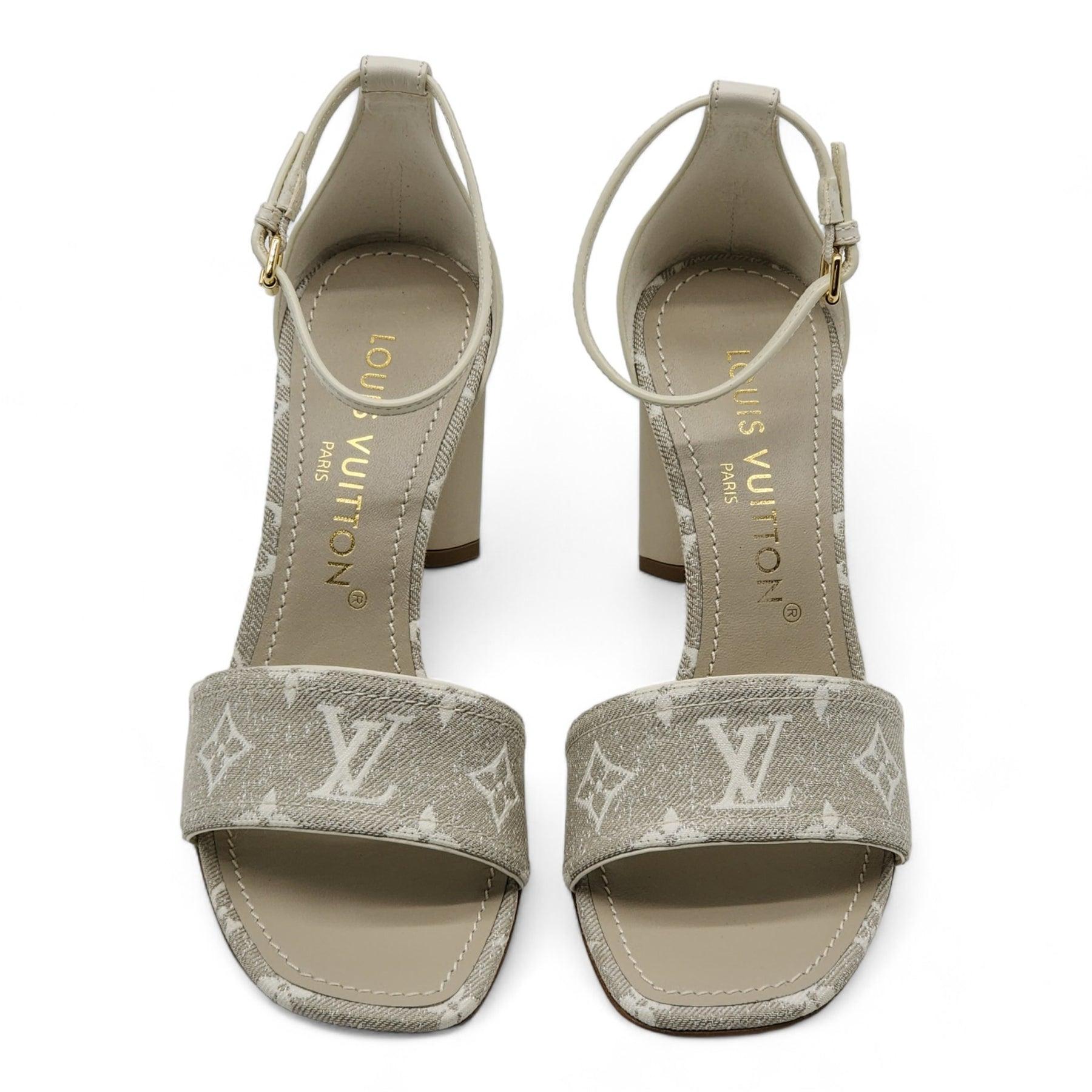 Louis Vuitton Monogram Denim Silhouette Sandals in Ivory.

Additional information:
Material: Leather 
Monogram denim. 
Leather outsole
Color: Gray
Size: 6.5 US
Country: Italy
Monogram Flower-shaped heel
Dimension: 8 cm/3.1-inch heel
Condition: Brand