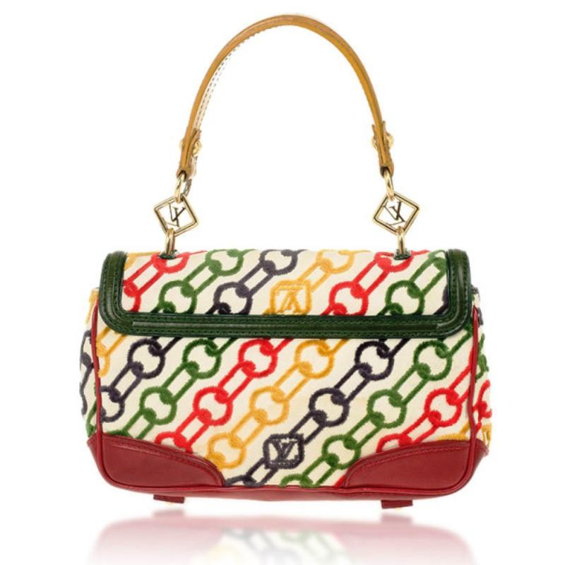 From the Spring/Summer 2006 collection, the line was inspired by the 60's era. This bag is made from canvas with leather trim and accented with red, green and yellow velvet chains monogram. A Louis Vuitton padlock is accenting and assisting the flip