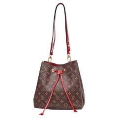 Sac Neonoe Mm rouge à cordon coulissant monogrammé Louis Vuitton