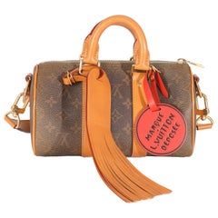 Louis Vuitton Monogram Dust Canvas Keepall Bandouliere 25